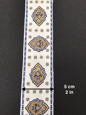 french quilt border fabrics with blue white and gold tones